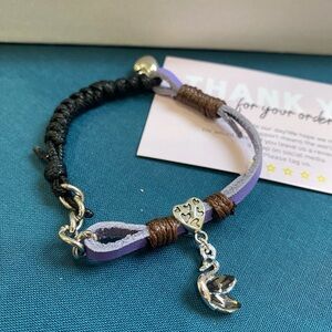 Black braided bracelet with Swan Crystal charm